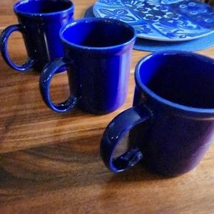 Royal blue coffee mugs, set of three, in very good condition.